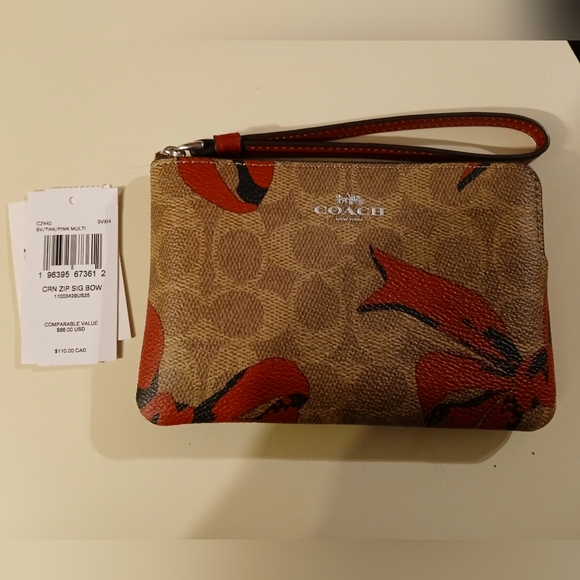 Coach NWT Tan Wristlet with Large Pink Bows - Picture 2 of 7